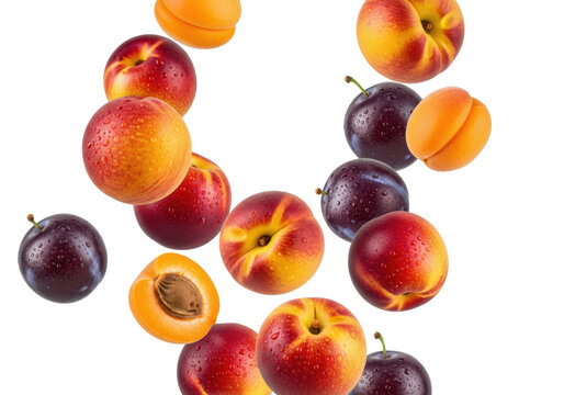 A collection of fresh peaches, plums, nectarines, and apricots with water droplets tumbling in the air against a white background. healthy food concept