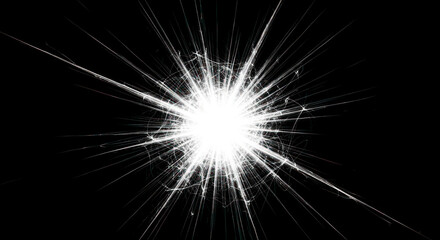 Fototapeta premium A bright white starburst explodes outward from a central point against a stark black background. Thin, white lines radiate from the core, creating a dynamic and energetic visual effect.