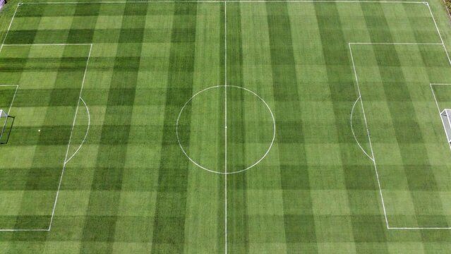 Aerial view of a pristine green soccer field sports location gigapixel art scale