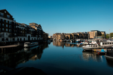 Fototapeta premium Limehouse basin London dock marina with residential buildings and boats