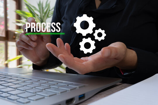Hands hold floating gears and the word "PROCESS". Ideal for corporate, technology, or workflow-related content.