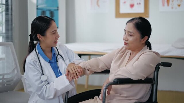 Doctor or Mental health and elderly care concept.Close up hands of doctor or caregiver hands elderly home care or hospital.Arthritis person's hand in support of geriatric nursing caregiver in hospital