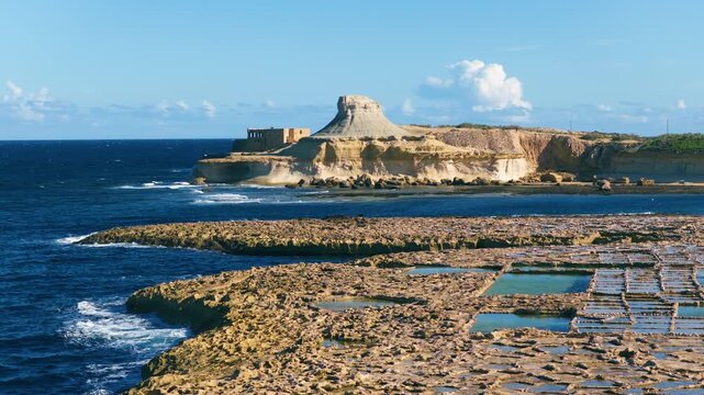 Xwejni Salt Pans On The Northern Coast Of Gozo Island In Malta - Drone Shot