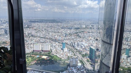 Cityscape in Ho Chi Minh City, Vietnam: Panoramic view of the skyline with the Saigon River and high-rise buildings in 2020 © Mitsuhito-Honda