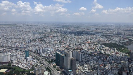 Cityscape in Ho Chi Minh City, Vietnam: Panoramic view of the skyline with the Saigon River and high-rise buildings in 2020 © Mitsuhito-Honda