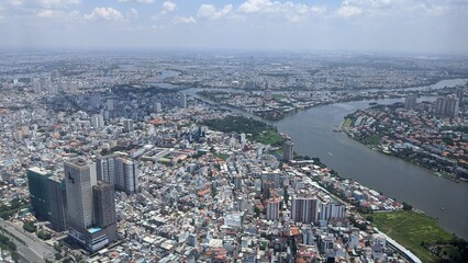 Cityscape in Ho Chi Minh City, Vietnam: Panoramic view of the skyline with the Saigon River and high-rise buildings in 2020 © Mitsuhito-Honda