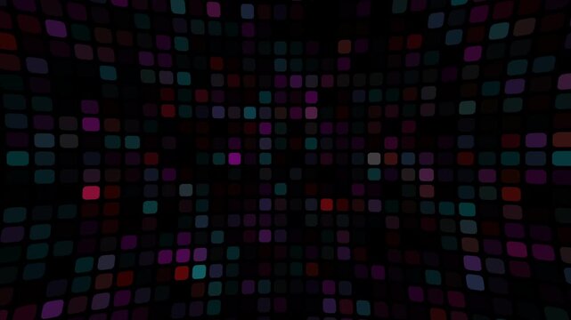 Abstract dynamic grid of colorful rounded squares flickering on a dark background with a subtle curved perspective effect for modern digital motion graphics and video backdrops