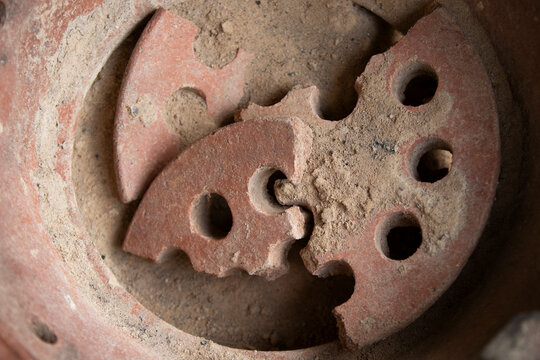 Old clay pot for cooking in the kitchen, closeup of photo
