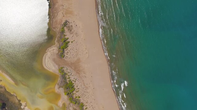 Dalyan, Turkey. Iztuzu Beach, a vast natural sandbar stretching between turquoise Mediterranean waves and the Dalyan River delta, aerial drone view of pristine golden shoreline. Aerial View, HEAD OVE