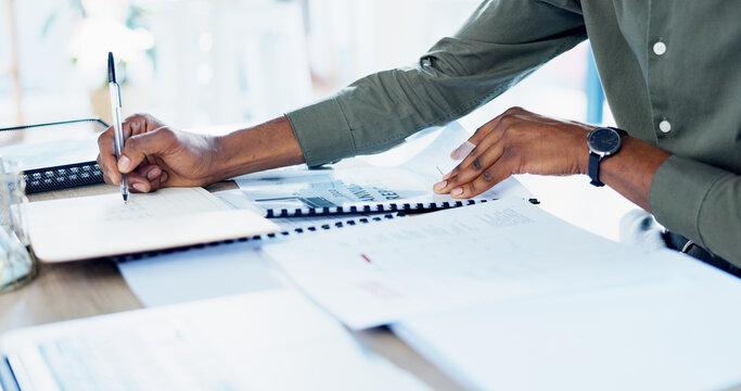Documents, writing and hands of businessman in office with annual finance report for planning. Paperwork, notes and male financial analyst with budget auditing for company investment in workplace.