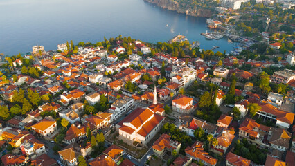 Obraz premium Antalya, Turkey. Aerial composition of historic Kaleici Old Town with Mediterranean Sea and yacht marina in morning sunlight.. Aerial View