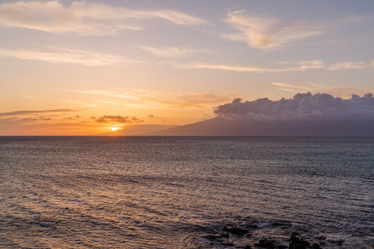 Calm ocean at sunset in Hawaii