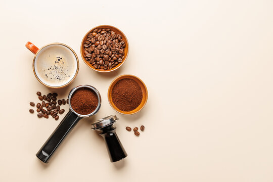 Espresso coffee setup with beans tamper and portafilter top view