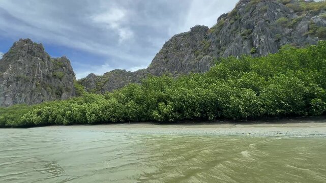 A boat trip through the mangrove forests of Khlong Khao Daeng in Khao Sam Roi Yot National Park, Prachuap Khiri Khan Province, Thailand.