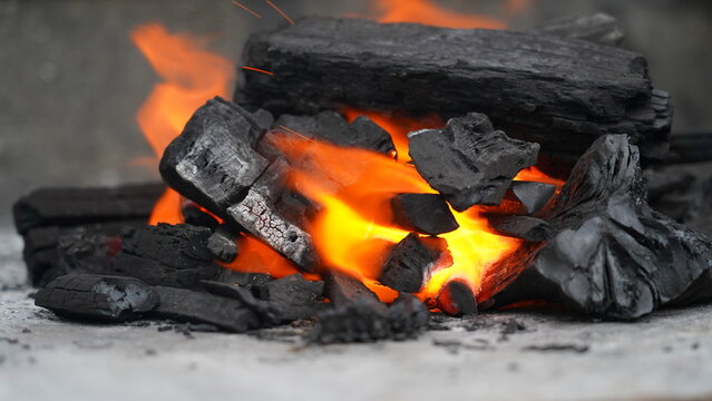 Burning Charcoal Emitting Intense Heat and Glowing Embers
