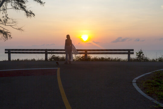 Sunrise and traveler with silhouette