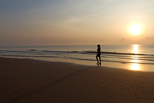 Women with sunrise walking