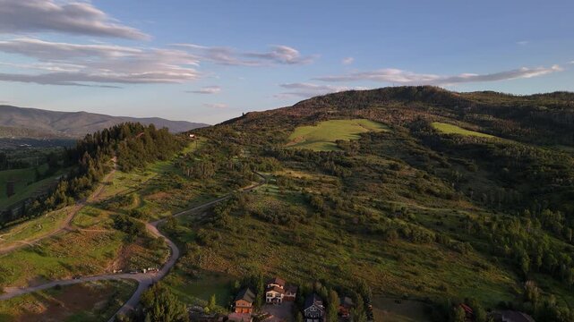 Aerial View of Emerald Mountain, Green Hills Above Steamboat Springs, Colorado USA, Drone Shot