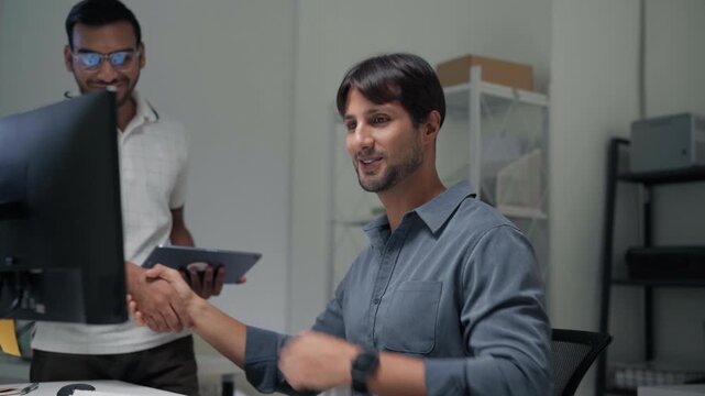 Engineer man indian latin success teamwork and handshake for developr programmer coding AI artificial intelligence algorithm coder training monitor