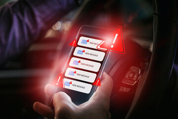Scam message notification appears on a smartphone while driving