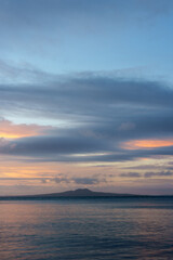 Fototapeta premium Coastal morning light scenic view to Rangitoto Island Auckland New Zealand.