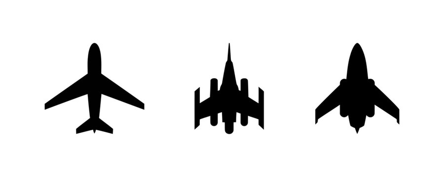 Three black silhouettes of different airplanes flying in formation