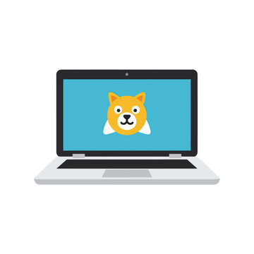 Laptop with Doge cartoon character.