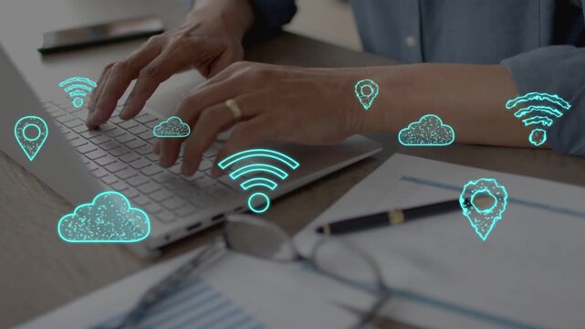 Man typing laptop WiFi icon appearing and causing cloud and map pins showing network over keys