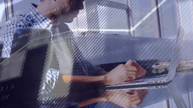 Office worker typing on laptop and initiating sliding software and line charts over glossy desk