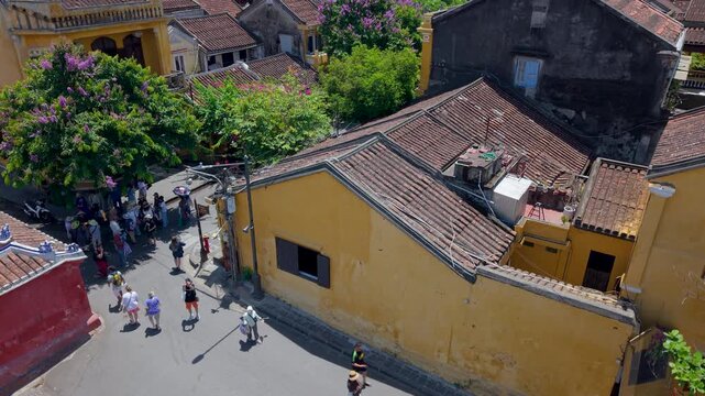 Aerial drone view of Hoi An city, Quang Nam province, Vietnam. Panoramic footage of Ancient town, UNESCO world heritage. One of the most travel popular touristic destinations