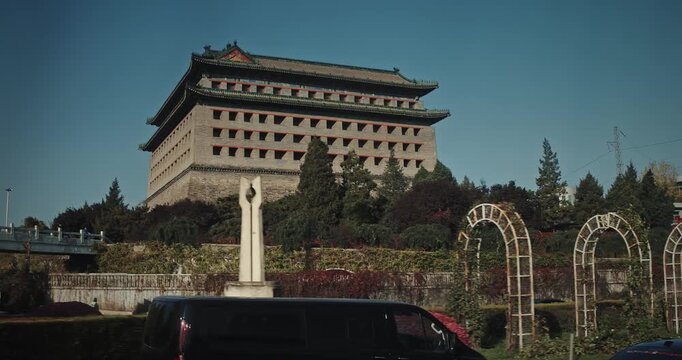 Traditional architectural features amidst urban landscape. Beijing Ming City Wall Ruins