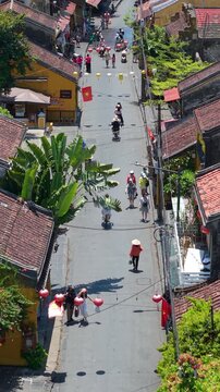 Aerial drone view of Hoi An city, Quang Nam province, Vietnam. Panoramic footage of Ancient town, UNESCO world heritage. One of the most travel popular touristic destinations