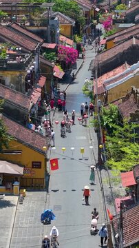 Aerial drone view of Hoi An city, Quang Nam province, Vietnam. Panoramic footage of Ancient town, UNESCO world heritage. One of the most travel popular touristic destinations