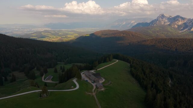 Teisenberg hills and Stoisser Alm with panoramic Salzburg and Chiemgau mountain scenery. Cinematic aerial