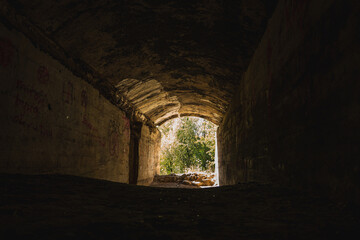 Naklejka premium A dark tunnel inside an abandoned fortress Brest, Lublin Voivodeship