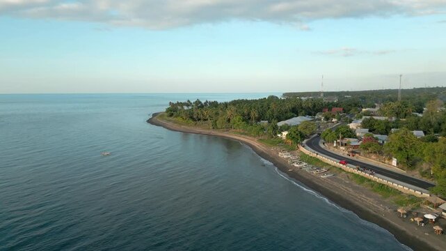 Nipah Beach West Lombok Indonesia Drone Rise Over Ocean At Sunset 4K 60FPS