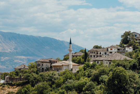 Historic Gjirokaster old town with mosque and mountains