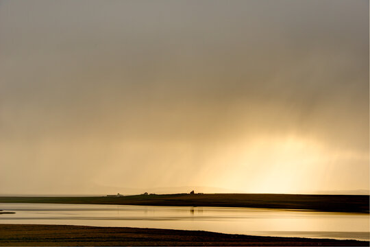 Silhouette sunset of icelandic lakeside wilderness
