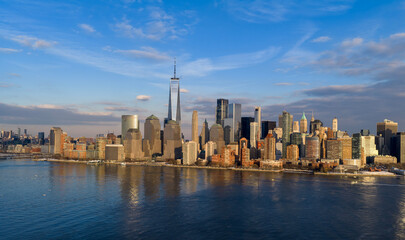 Fototapeta premium New York City skyline over Hudson River. Manhattan aerial view in New York City. NYC Manhattan waterfront panorama. New York skyline panorama.
