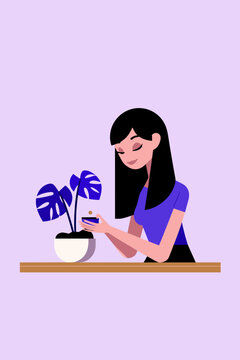 Woman Checking Smart Plant Pot Sensor with Green LED Indicator