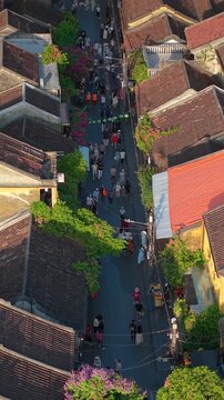 Aerial drone view of Hoi An city, Quang Nam province, Vietnam. Panoramic footage of Ancient town, UNESCO world heritage. One of the most travel popular touristic destinations