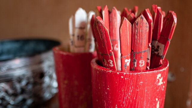 Close up shot of traditional Chinese fortune telling chi chi sticks in Bangkok, Thailand, 2012