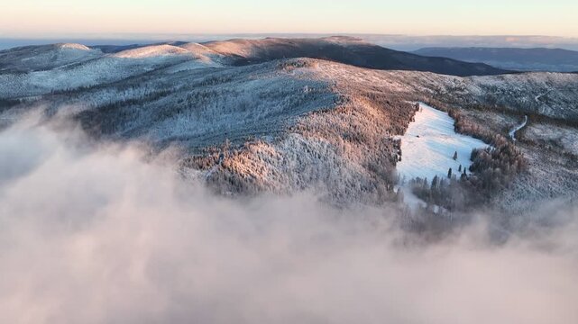 Winter Mountains Sunrise Aerial Backward Flight Above Clouds