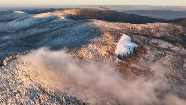 Winter Mountains Early Morning Aerial Backward Flight