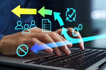 Change management for enterprise IT systems. Business impact analysis and migration roadmap. Businessman creating communication plan on laptop computer. © tadamichi