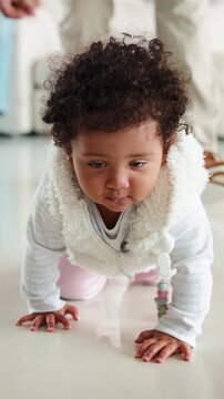 Parent, baby or happy for learning to crawl in home for motor skills, growth or independent mobility. Family, movement or excited kid on floor with balance, explore or physical milestone for progress