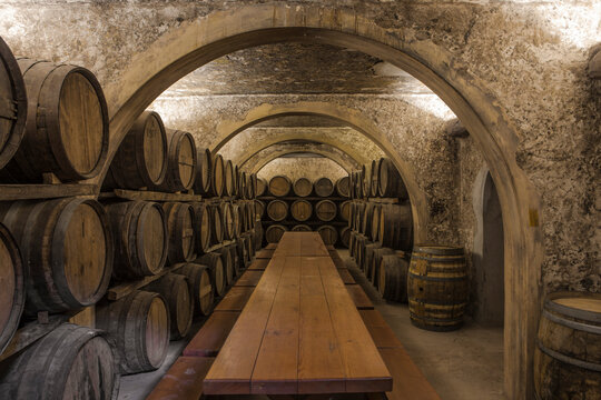 Wine barrels in wine cellar