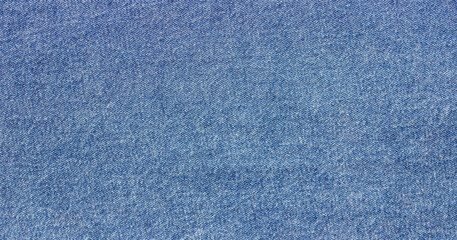 Fototapeta premium texture of light blue jeans denim fabric background