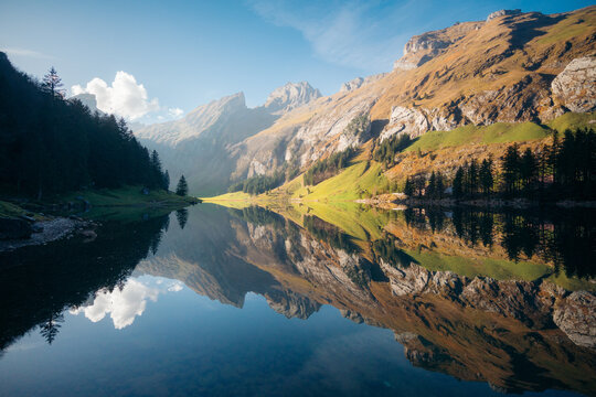 Switzerland mountain scenery at iconic Seealpsee lake in fall, Appenzellerland, Switzerland