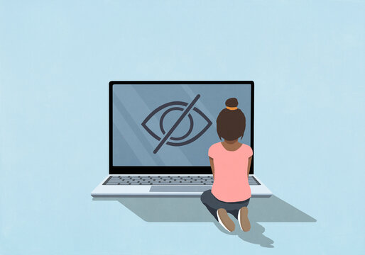 Young girl looking at laptop screen with privacy control protection